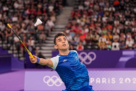 Lakshya Sen plays a shot during the badminton singles quarterfinal